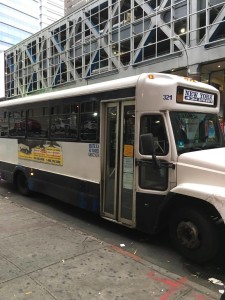 Bergenline jitney, operated by Fuji Express, about to board on 42nd street